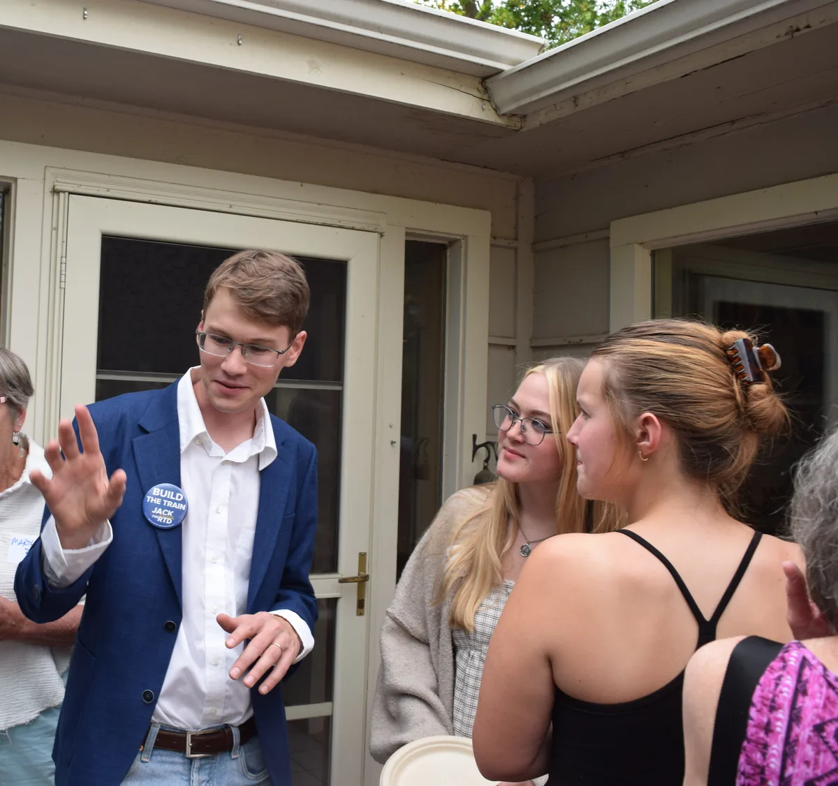 Jack Rosenthal talking with supporters at a campaign fundraiser